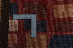 Close-up detail of 2000s Persian Gabbeh rug from Iran / Persia showing Wool weave