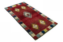 Close-up detail of 2000s Persian Gabbeh rug from Iran / Persia showing Wool weave