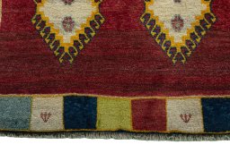 Central medallion detail of 2000s Persian Gabbeh rug from Iran / Persia