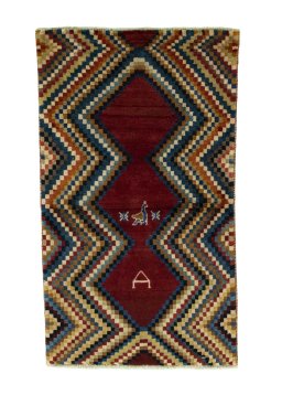 Full view of 2000s Persian Gabbeh rug from Iran / Persia, 137 × 81 cm in Red tones
