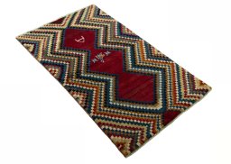 Close-up detail of 2000s Persian Gabbeh rug from Iran / Persia showing Wool weave