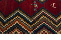 Close-up detail of 2000s Persian Gabbeh rug from Iran / Persia showing Wool weave