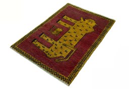 Corner detail of 2000s Persian Gabbeh rug showing border pattern and Wool pile