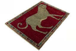 Corner detail of 2000s Persian Gabbeh rug showing border pattern and Wool pile