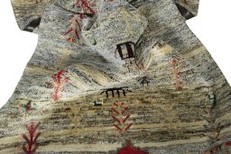 Corner detail of 2000s Persian Gabbeh rug showing border pattern and Wool pile