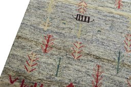 Backside of handmade 2000s Persian Gabbeh rug showing knot structure and weave density