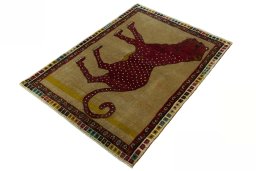 Corner detail of 2000s Persian Gabbeh rug showing border pattern and Wool pile