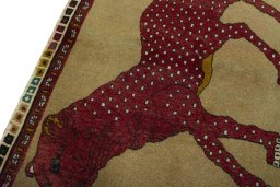 Backside of handmade 2000s Persian Gabbeh rug showing knot structure and weave density