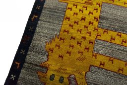 Backside of handmade 2000s Persian Gabbeh rug showing knot structure and weave density