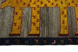Close-up detail of 2000s Persian Gabbeh rug from Iran / Persia showing Wool weave