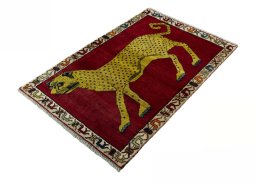 Corner detail of 2000s Persian Gabbeh rug showing border pattern and Wool pile