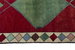Close-up detail of 2000s Persian Gabbeh rug from Iran / Persia showing Wool weave