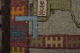 Close-up detail of 2000s Persian Gabbeh rug from Iran / Persia showing Wool weave