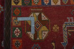 Close-up detail of 2000s Persian Gabbeh rug from Iran / Persia showing Wool weave