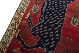 Backside of handmade 2000s Persian Gabbeh rug showing knot structure and weave density