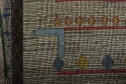 Close-up detail of 2000s Persian Gabbeh rug from Iran / Persia showing Wool weave