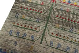 Backside of handmade 2000s Persian Gabbeh rug showing knot structure and weave density