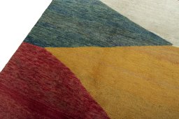 Backside of handmade 2000s Persian Gabbeh rug showing knot structure and weave density