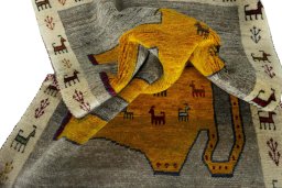 Corner detail of 2000s Persian Gabbeh rug showing border pattern and Wool pile