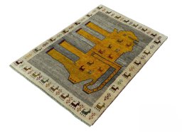 Corner detail of 2000s Persian Gabbeh rug showing border pattern and Wool pile