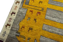 Backside of handmade 2000s Persian Gabbeh rug showing knot structure and weave density