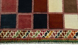 Central medallion detail of 2000s Persian Gabbeh rug from Iran / Persia