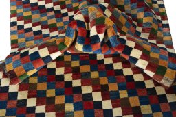 Corner detail of New Persian Gabbeh rug showing border pattern and Wool pile