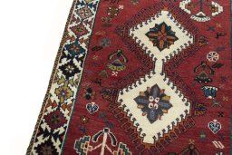 Backside of handmade 2000s Persian Gabbeh rug showing knot structure and weave density