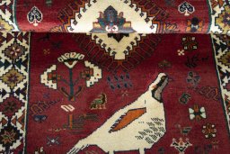 Full view of 2000s Persian Gabbeh rug from Iran / Persia, 175 × 97 cm in Red tones