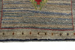 Central medallion detail of 2000s Persian Gabbeh rug from Iran / Persia