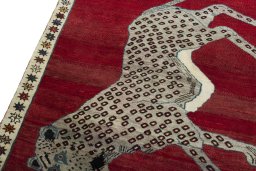 Backside of handmade 2000s Persian Gabbeh rug showing knot structure and weave density