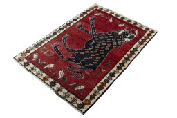 Corner detail of 2000s Persian Gabbeh rug showing border pattern and Wool pile