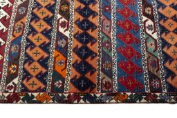 Close-up detail of 2000s Persian Gabbeh rug from Iran / Persia showing Wool weave