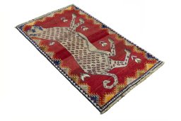Close-up detail of 2000s Persian Gabbeh rug from Iran / Persia showing Wool weave