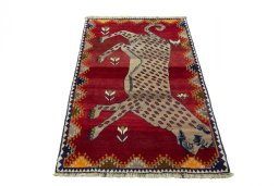 Surface texture of 2000s Persian Gabbeh rug with natural Wool and intricate pattern