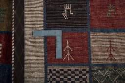 Close-up detail of 2000s Persian Gabbeh rug from Iran / Persia showing Wool weave