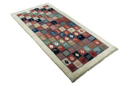 Close-up detail of 2000s Persian Gabbeh rug from Iran / Persia showing Wool weave