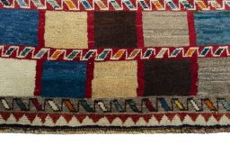 Central medallion detail of 2000s Persian Gabbeh rug from Iran / Persia