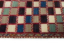 Close-up detail of 2000s Persian Gabbeh rug from Iran / Persia showing Wool weave