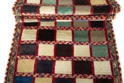 Full view of 2000s Persian Gabbeh rug from Iran / Persia, 280 × 104 cm in Multi Color tones