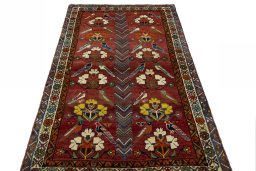 Surface texture of 1970s Persian Gabbeh rug with natural Wool and intricate pattern