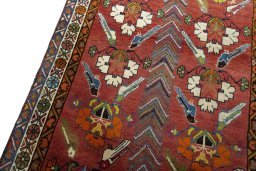 Backside of handmade 1970s Persian Gabbeh rug showing knot structure and weave density