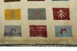 Central medallion detail of 2000s Persian Gabbeh rug from Iran / Persia