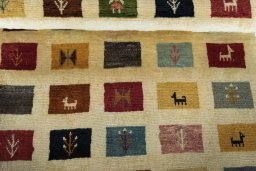 Full view of 2000s Persian Gabbeh rug from Iran / Persia, 155 × 86 cm in Beige tones