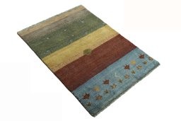 Close-up detail of 2000s Persian Gabbeh rug from Iran / Persia showing Wool weave