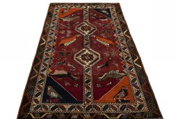 Surface texture of 2000s Persian Gabbeh rug with natural Wool and intricate pattern
