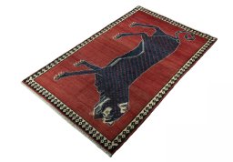 Corner detail of 2000s Persian Gabbeh rug showing border pattern and Wool pile