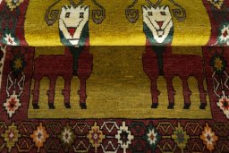 Full view of 2000s Persian Gabbeh rug from Iran / Persia, 153 × 102 cm in Yellow tones
