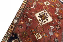 Backside of handmade 2000s Persian Gabbeh rug showing knot structure and weave density