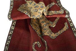 Corner detail of 2000s Persian Gabbeh rug showing border pattern and Wool pile